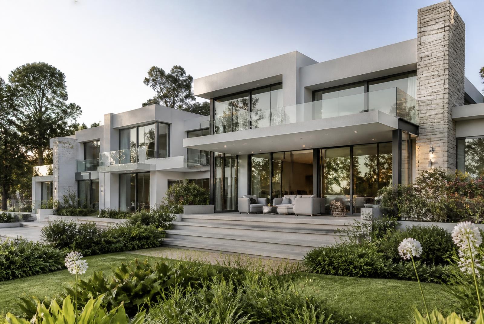 Contemporary private residence in Sandton with stone cladding, flat roof lines and full-height glazing